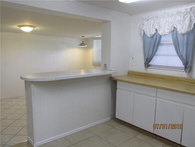 Extra cabinets and counter space in kitchen.