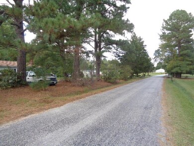 LOT NEAR HOUSES, PAVED ROADS