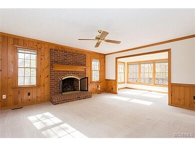 Lovely family room opens to sun room!  Lots of lig