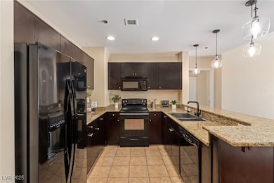 Black appliances perfectly complement the stylish
