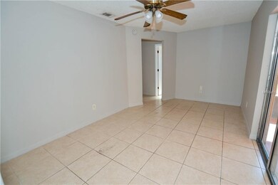 Family room with sliding glass doors to screened l