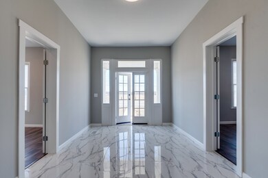 Interior view of the Entry Foyer. To the left is the Master en suite, to the right Bedroom 2.