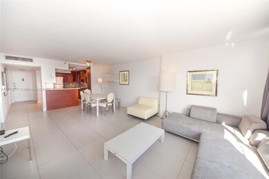 Unit is partially furnished. Large grey sofa is not included and has been removed.