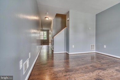 1131 N Mount St, Baltimore, MD 21217 - photo 3