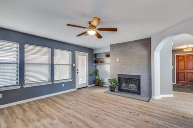 Unfurnished living room with light wood-type floor
