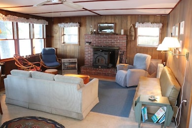 7 Living room with wood stove _ propane