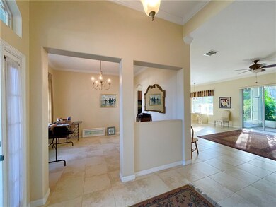 Foyer to dining room to the right from inside faci