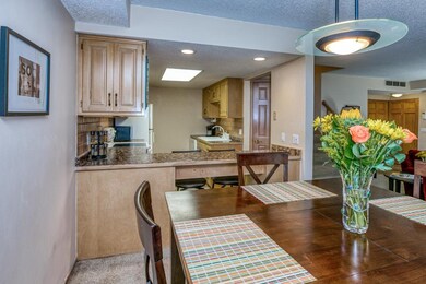 The kitchen opens into the Dining Room. Notice the