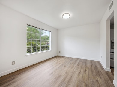 Spare room with light wood-style floors