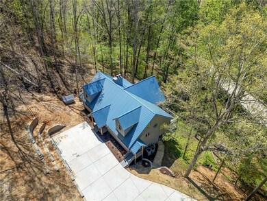 Drone / aerial view featuring a view of trees