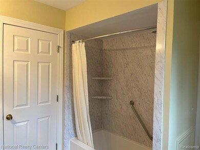 Full bathroom with shower / bathtub combination with curtain