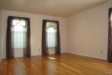 Gleaming hardwood floors in the front Living-room