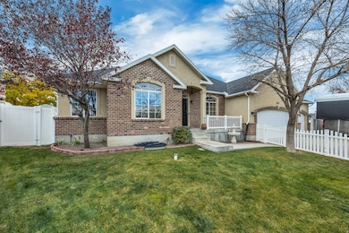 3628 S Peach Flower Ln, West Valley City, UT 84128 - photo 2