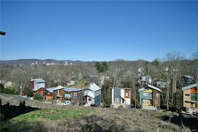 View from lot. A portion of the lot shows in the b