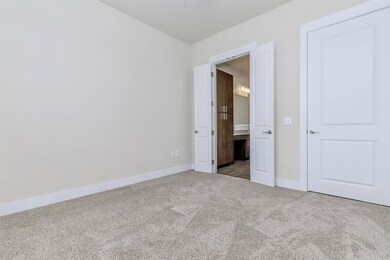 Spacious bedroom with walk in closet and ensuite b