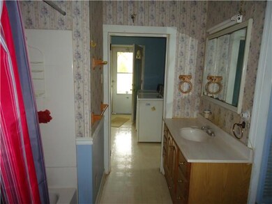 bathroom has tub/shower combo