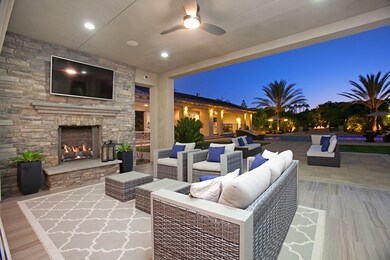 Back Outdoor Fireplace just outside open Family Ro