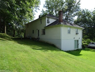 Back and side view of home