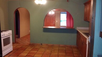 From kitchen thru arches