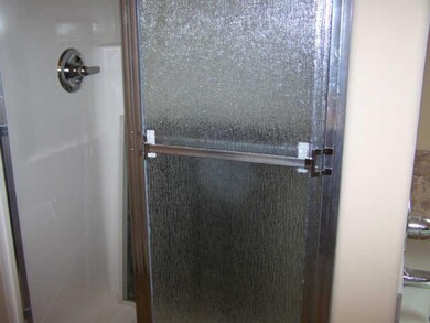 Separate shower in master bathroom.