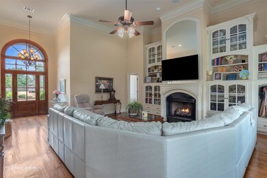 Living room featuring wood-type flooring, ceiling 