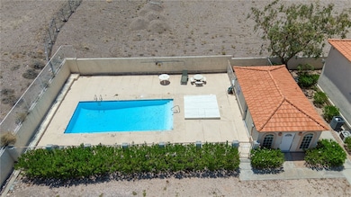 View from above of property with a pool area