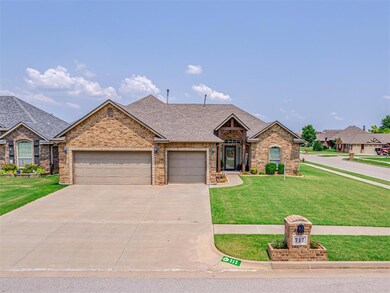 Front View of 717 Brian Ct. featuring a 3-car gara