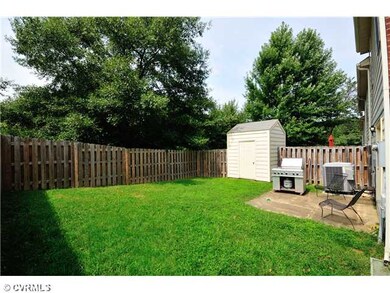 Exterior Back - Great end unit fenced back yard wi