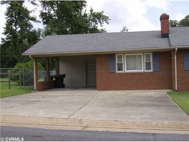 Parking Lot/Garage - Carport with double width, concrete-paved driveway