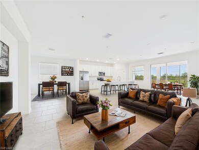 Living room with light tile patterned flooring, vi