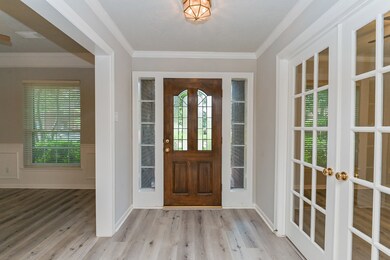Foyer opens to dining room and study