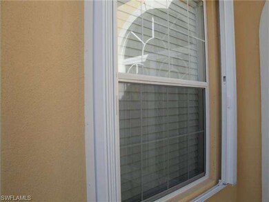 Accordion storm shutters on all windows.