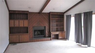 Living room with double sliding glass doors to deck