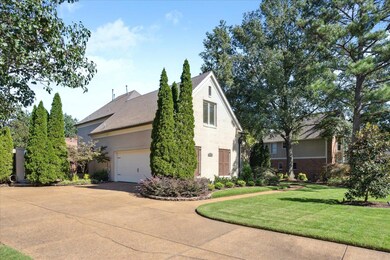 View of front facade featuring a garage and a fron