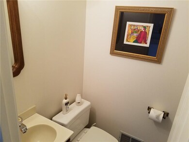 FIRST FLOOR POWDER ROOM.