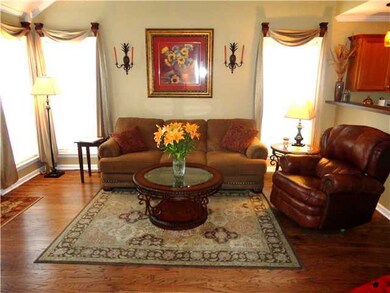 Rich hardwoods in light-filled Greatroom