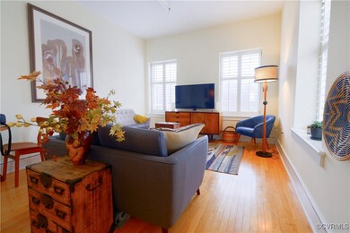 Living room with light wood flooring