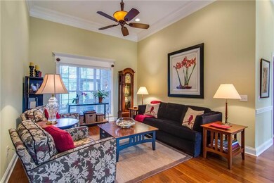 Formal living room with big picture window, recessed lighting, high ceiling, a great place to gather together with those you love