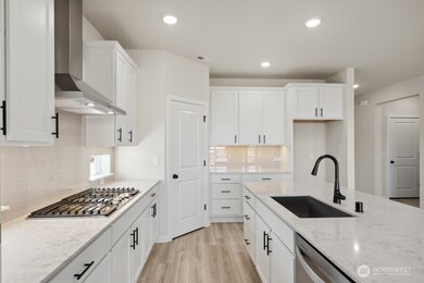 Photos are a completed home of the same floorplan.