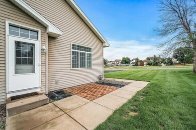 Enjoy the summer nights on a lovely paver patio, overlooking Prairie Oaks Park