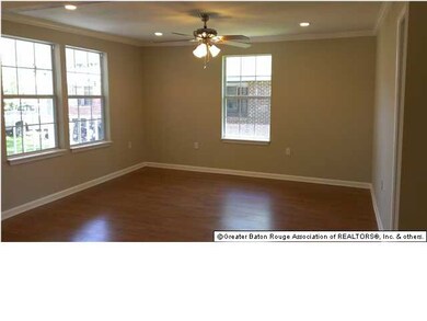 New wood floors in a spacious living room
