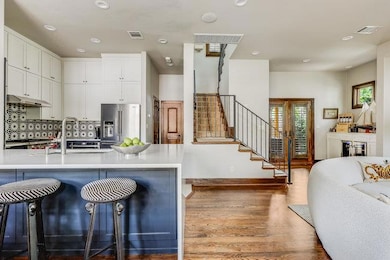 Kitchen with stainless steel fridge with ice disp
