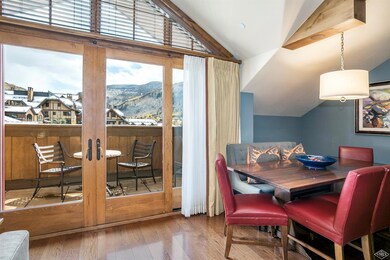 Dining area opens to the private deck an
