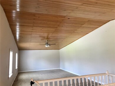 Expansive Family Room with Vaulted Ceiling