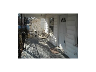 Cozy front porch with swing