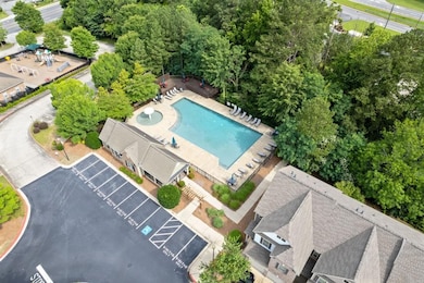 Community Amenities include a Swimming Pool, Playground, Private Walking Trails, a Clubhouse, Sidewalks, and plenty of Guest Parking.