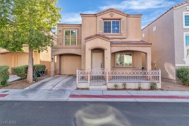 View of front of home with driveway, stucco siding