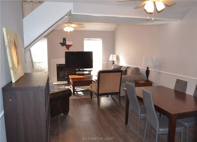 Large open living space with wood-burning fireplac
