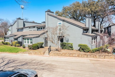 View of side of property featuring stucco siding a