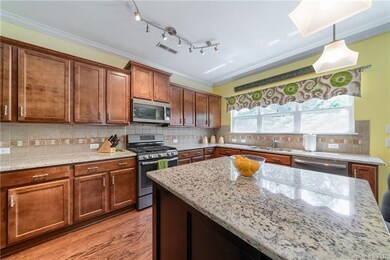 Large Kitchen with Gas Stove and Large Island